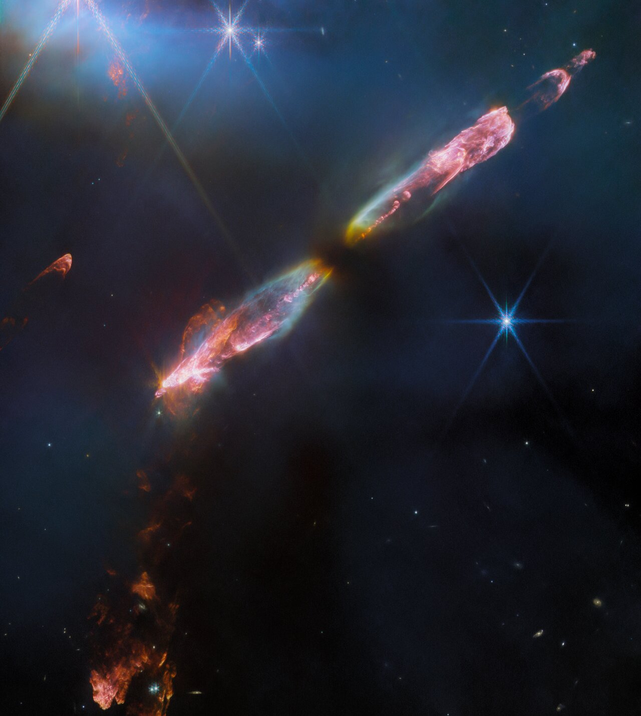 The image showcases a series of bow shocks to the southeast (lower-left) and northwest (upper-right) as well as the narrow bipolar jet that powers them in unprecedented detail 