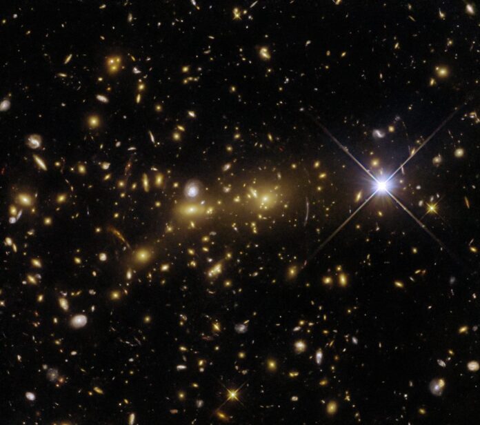 The NASA/ESA Hubble Space Telescope has captured a monster in the making in this observation of the exceptional galaxy cluster eMACS J1353.7+4329 The NASA/ESA Hubble Space Telescope has captured a monster in the making in this observation of the exceptional galaxy cluster eMACS J1353.7+4329