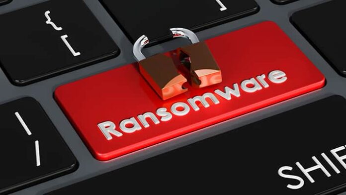 Ransomware red button on keyboard, 3D rendering ransomware