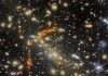 James Webb Captures Galaxies Warped by Gravity in Cosmic “House of Mirrors”