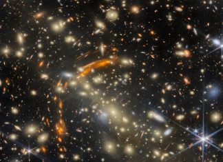 James Webb Captures Galaxies Warped by Gravity in Cosmic “House of Mirrors”